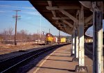 C&O 3877 switches cars beside the Seaboard Station and its curved platforms